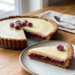 A full view of the finished cranberry white chocolate tart, ready to be served.